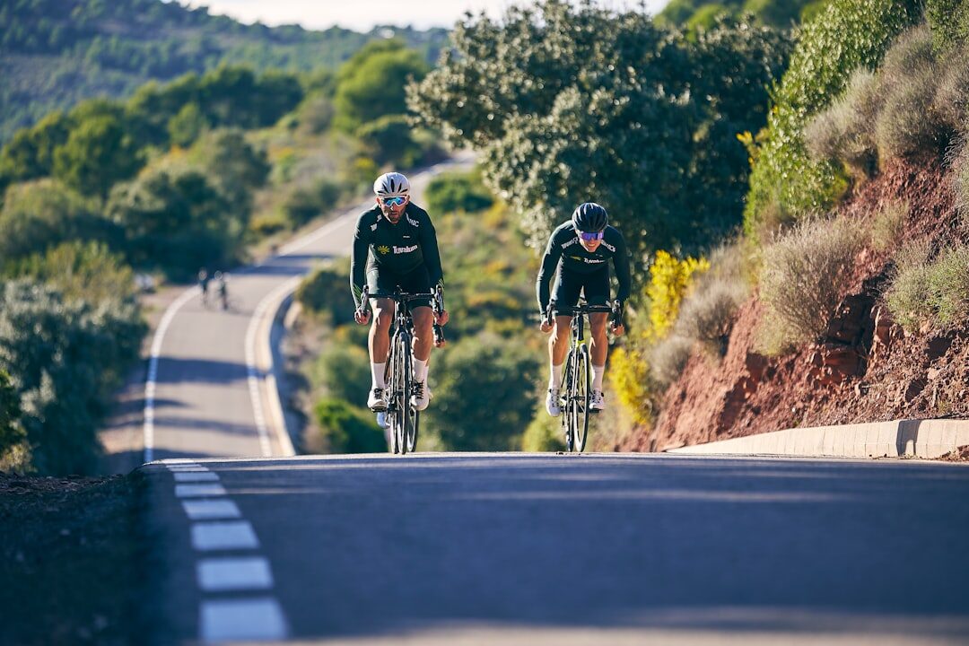 cyclist racing on road